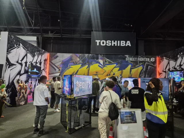 Young teenagers play games at an expo centre